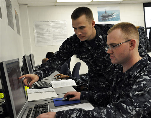 512px-US_Navy_111026-N-ZZ447-003_Hull_Technician_1st_Class_Nolan_R._Nichols_answers_a_question_on_the_computer-based_training_system NGEN