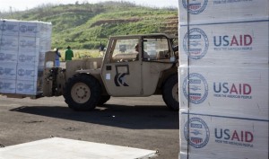Marines move USAID relief supplies in Dominica . (Photo via DOD)