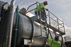 Team members with DLA transfer diesel fuel after Hurricane Maria in Puerto Rico.  (U.S. Army photo by: Sgt. Michael Eaddy)
